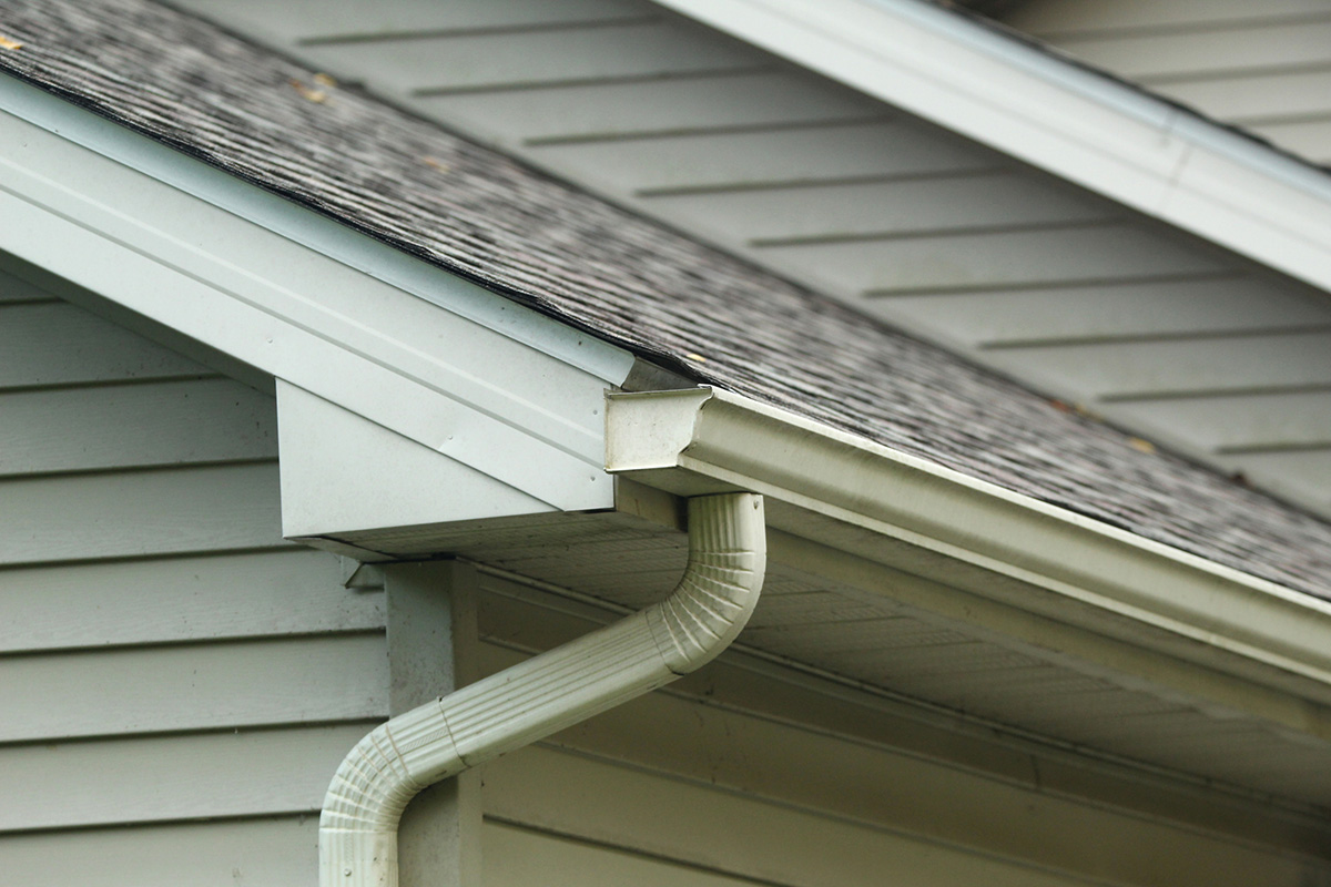 Close up view of fascia on sage green home