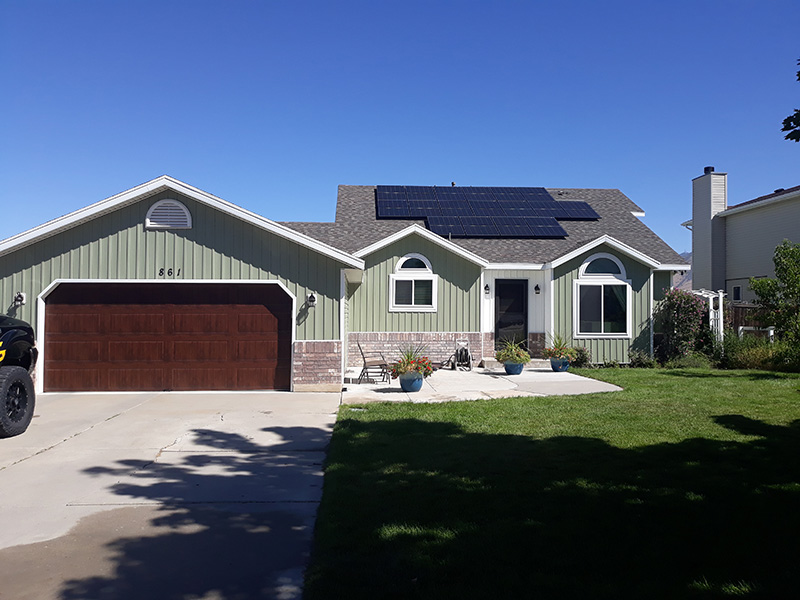 Ranch style home with Hardie Board green color