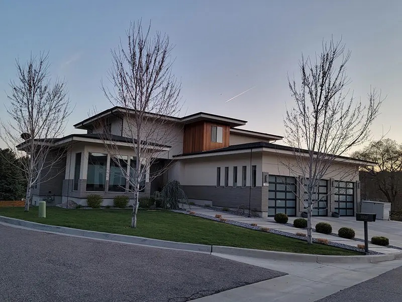 Modern style home with stucco and brick work